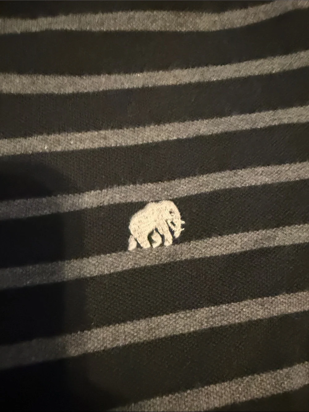 Banana Republic Black and Gray Striped Polo with Elephant Logo